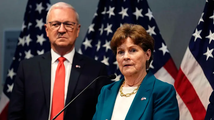 Sen. Jeanne Shaheen speaks at a news conference at the U.S. Embassy in Ottawa during a delegation to Canada on May 23, 2025, as Sen. Kevin Cramer listens. (Justin Tang/The Canadian Press)