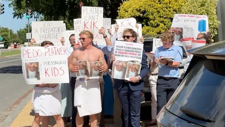 Republican staffers, including National Republican Senatorial Committee staffers, protest outside the Democratic Senatorial Campaign Committee headquarters in Washington, D.C., wearing towels to mock Maine Senate candidate Graham Platner&rsquo;s reported Kik profile photo. (Nicholas Ballasy/Fox News Digital)