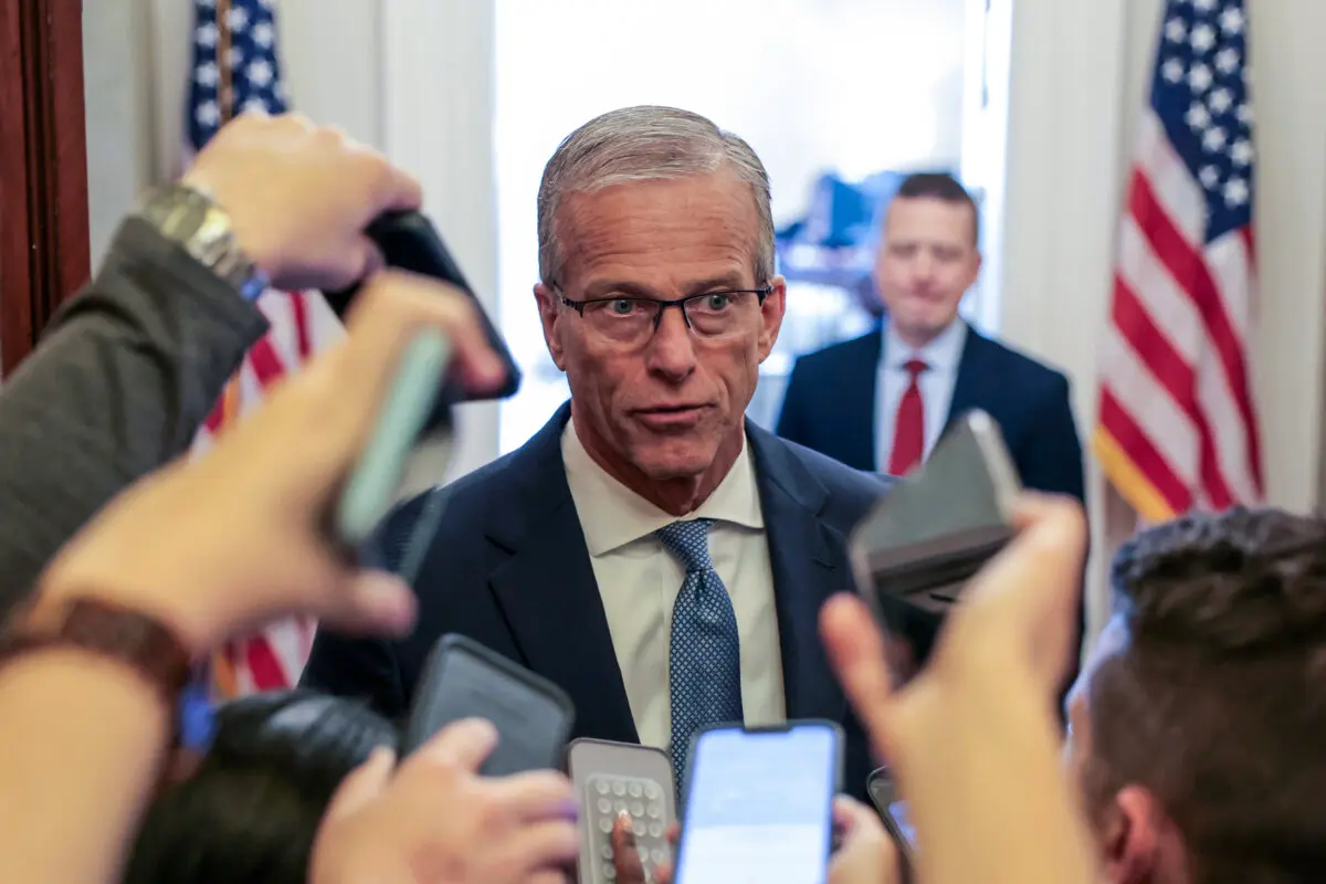 Senate Majority Leader John Thune (R-S.D.) speaks to reporters as he walks into his office at the U.S. Capitol Building in Washington on May 21, 2026. Anna Moneymaker/Getty Images