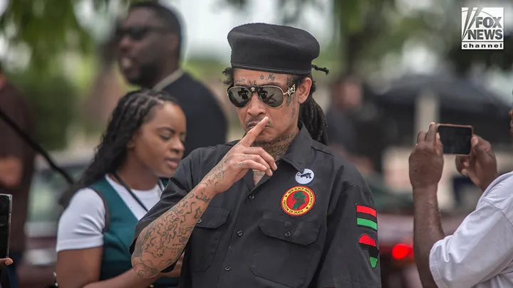An New Black Panther Party member stands outside of Collin County Courthouse where Karmelo Anthony is on trial for murder in McKinney, Texas, Monday, June 8, 2026. Anthony faces first-degree murder in the fatal stabbing of 17-year-old Austin Metcalf at a track meet in Frisco, Texas, in April 2025. (AJ Skuy for Fox News Digital)