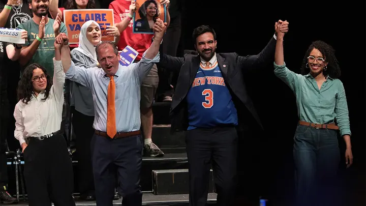 Congressional candidate Claire Valdez, Congressional candidate Brad Lander, Mayor Zohran Mamdani, and Congressional candidate Darializa Avila Chevalier raise their hands during a Get Out the Vote (GOTV) rally at King's Theater on June 18, 2026, in New York City. (Michael M. Santiago/Getty Images)