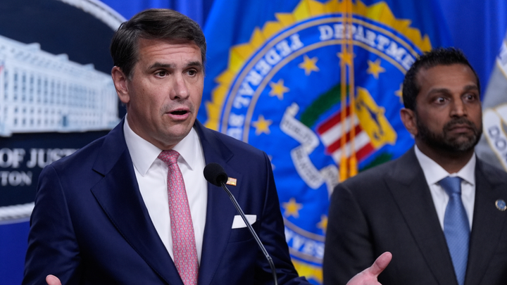 Acting Attorney General Todd Blanche speaks during a news conference at the Department of Justice as FBI Director Kash Patel listens in Washington on July 1, 2026. (AP Photo/Manuel Balce Ceneta)