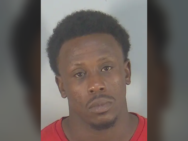 Florida Suspect Takes Off With Cop Trapped Inside His Car During Traffic Stop