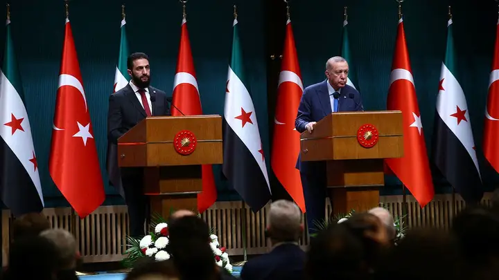 Syria's president Ahmed al-Sharaa and Turkey's President Tayyip Erdoğan attend a joint press conference at the Presidential Palace in Ankara, Turkey, February 4, 2025. (Cagla Gurdogan/Reuters)