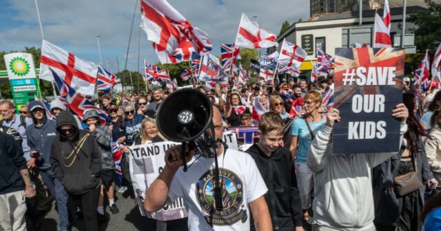 UK Citizens Erupt in Portsmouth Over Migrant Surge, Police Mask Ban Leads to Bizarre Arrest